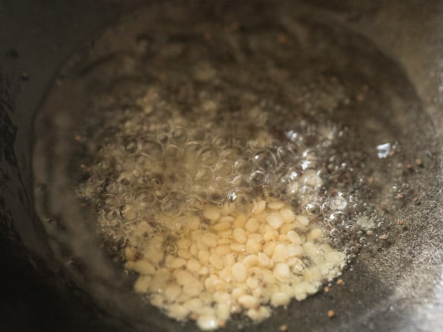 urad dal added to coconut oil. 