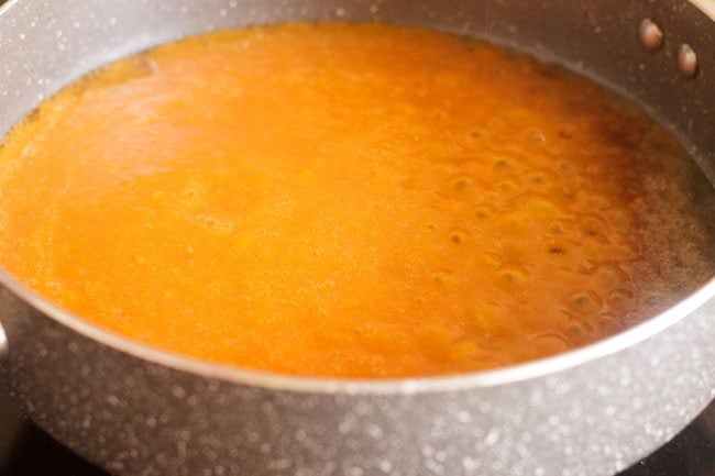 adding the vegetable puree in the pan