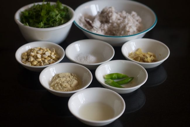 Measured ingredients are kept ready for making coriander coconut chutney. 