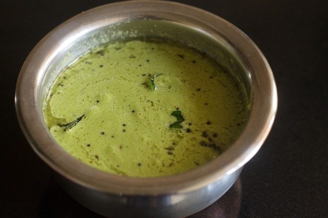 tempering mixed in the green coconut chutney. 