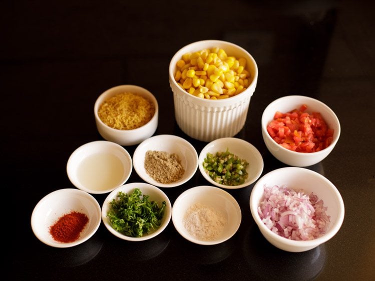 measured ingredients kept ready for corn chaat. 
