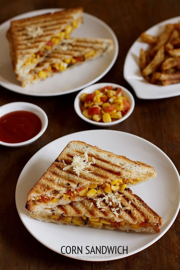 corn sandwich served on a white plate with tomato sauce