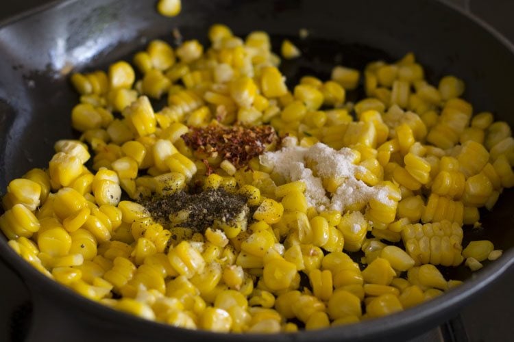 corn kernels seasoned with pepper, chili flakes and salt