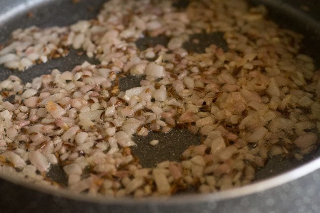 sautéed onions in pan.