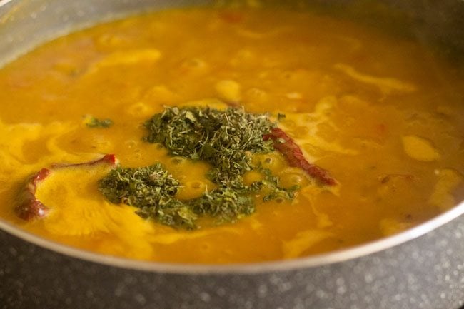 crushed dry fenugreek leaves added to masoor dal.