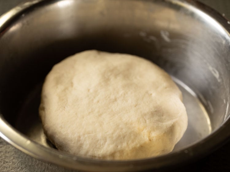 flatten the naan dough