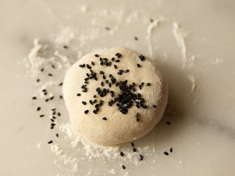 add nigella seeds to dough ball