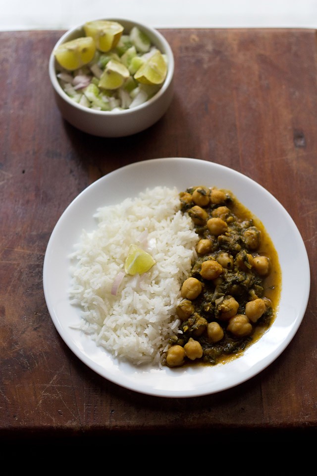 palak chole served in a plate with rice