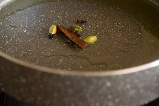 frying whole spices in the pot. 