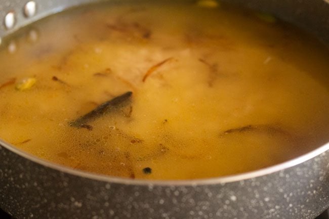 water mixed well with the rice and other ingredients in the pot. 