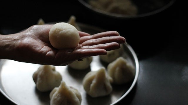 taking one rava mixture dough ball