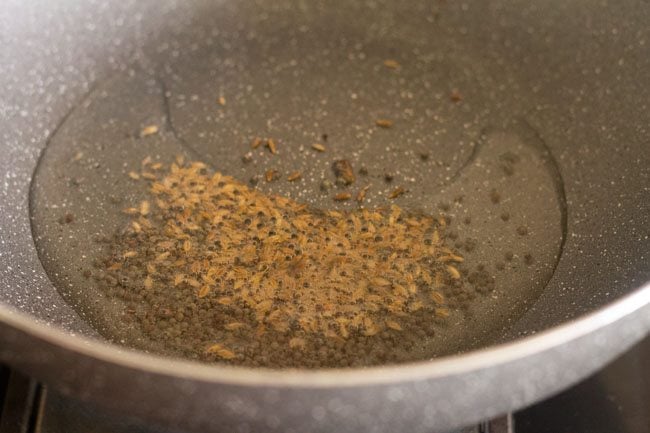 adding cumin seeds