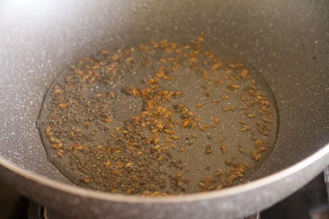 fry cumin seeds till browned