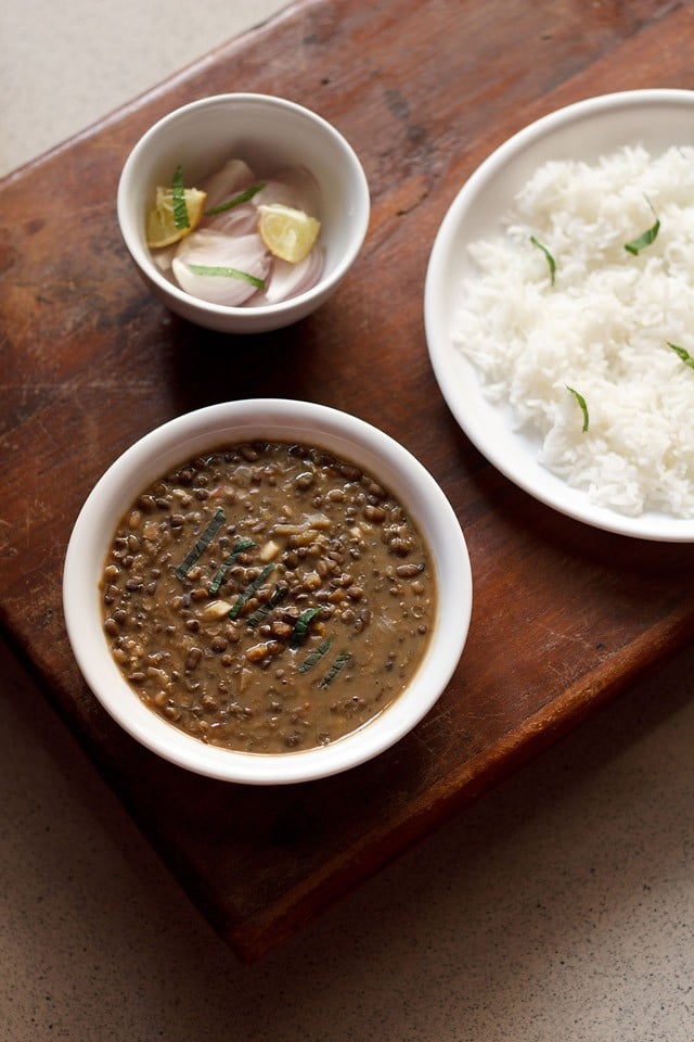 amritsari dal served with rice and a side of salad