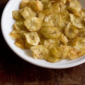 banana chips served in a white bowl.