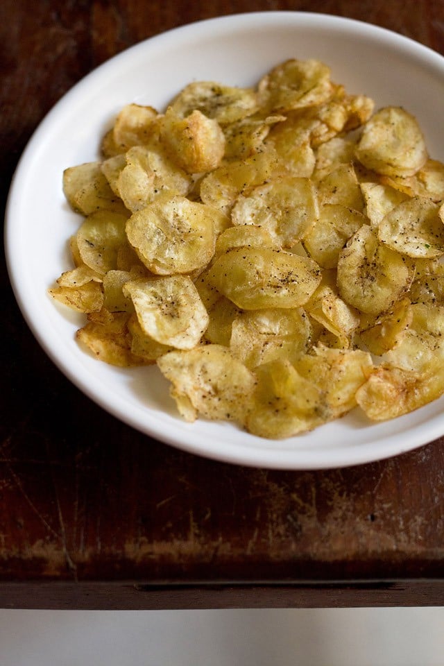 banana chips served in a white bowl.