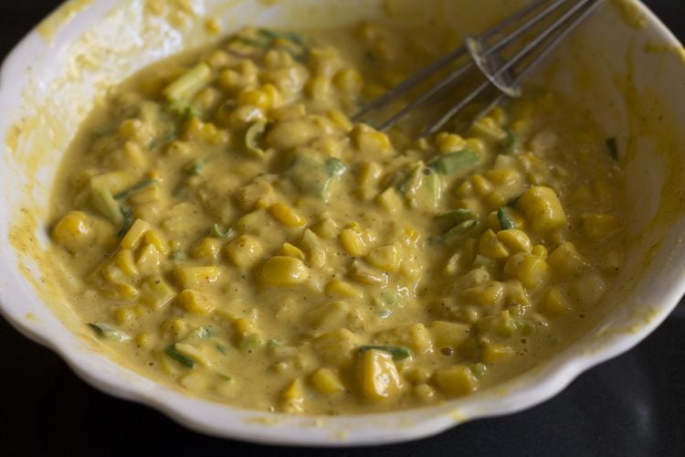 corn pakora batter in a bowl