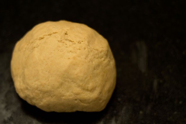 bread dough after punching down is about 1/2 as big as when it started.