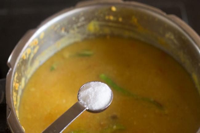 adding salt to dal