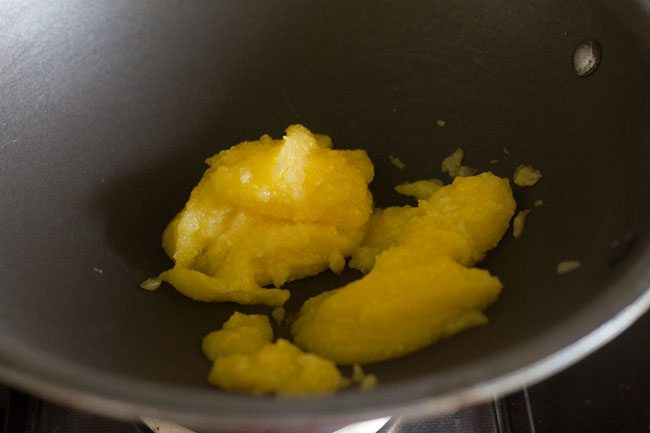 heating ghee or oil in a pan