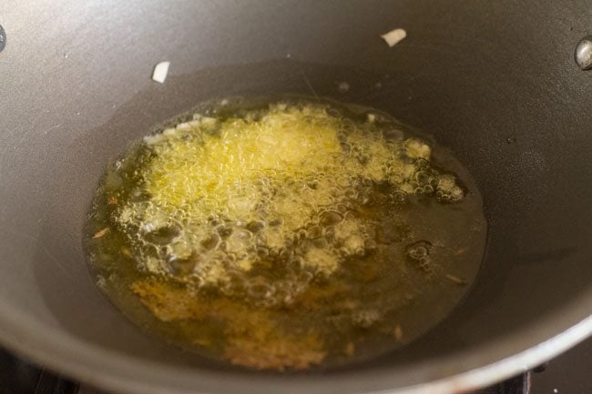 adding finely chopped garlic 