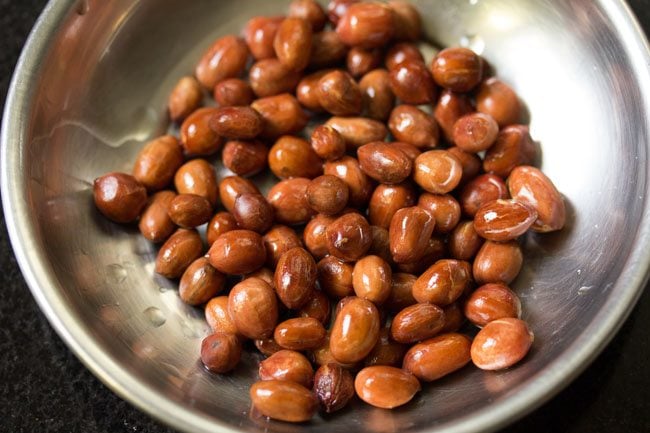 fried peanuts in a steel plate to make lemon rice recipe