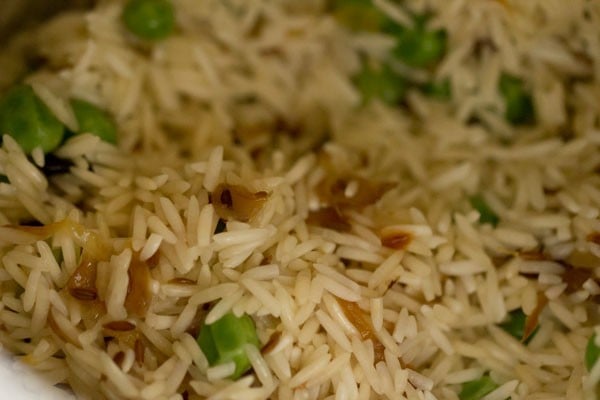 sautéing peas pulao mixture