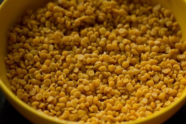 rinsing arhar dal in water