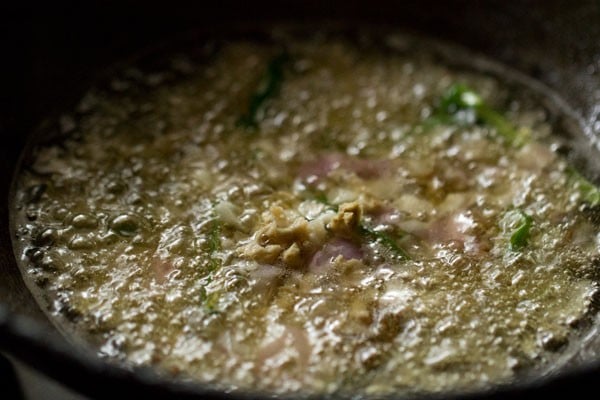 add onion ginger garlic and green chilies to the pan