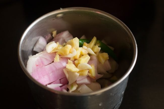 onions chillies in a blender jar