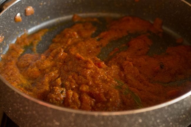 mixing masala mixture in the pan