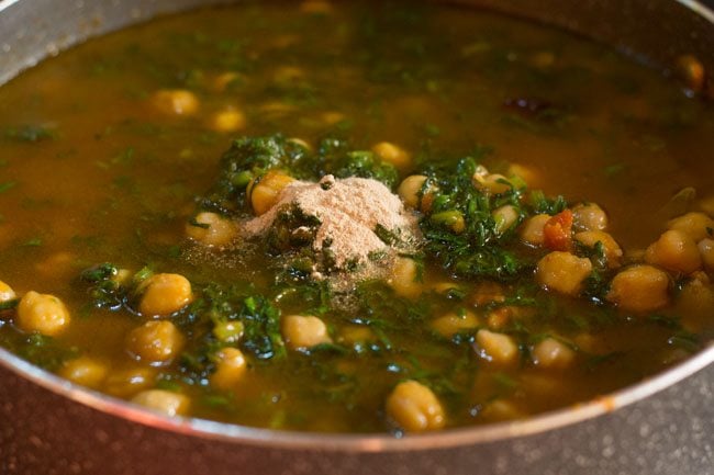 dry mango powder added to palak chole gravy