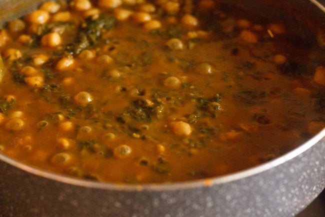 palak chole gravy in a pan