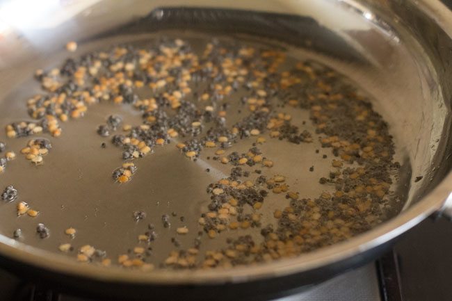 crackling mustard seeds on low heat