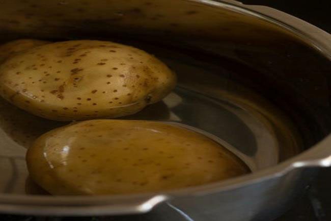 potatoes in water in a pressure cooker