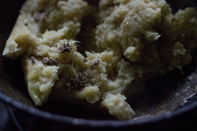 crushed green cardamoms added to the mashed sweet potatoes. 