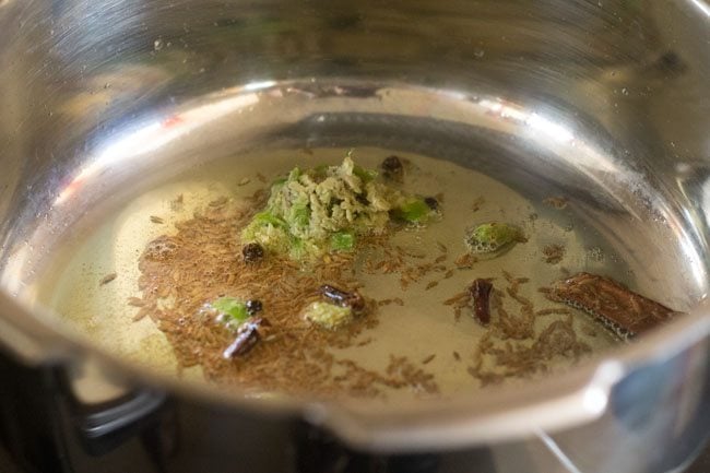 ginger-green chili paste added in the pan. 