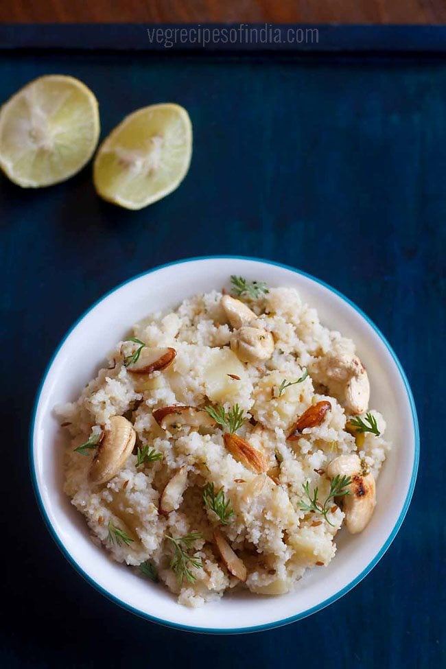 sama ke chawal ka pulao served in a light blue rimmed bowl with 2 lemon wedges kept on the top left side and text layovers. 