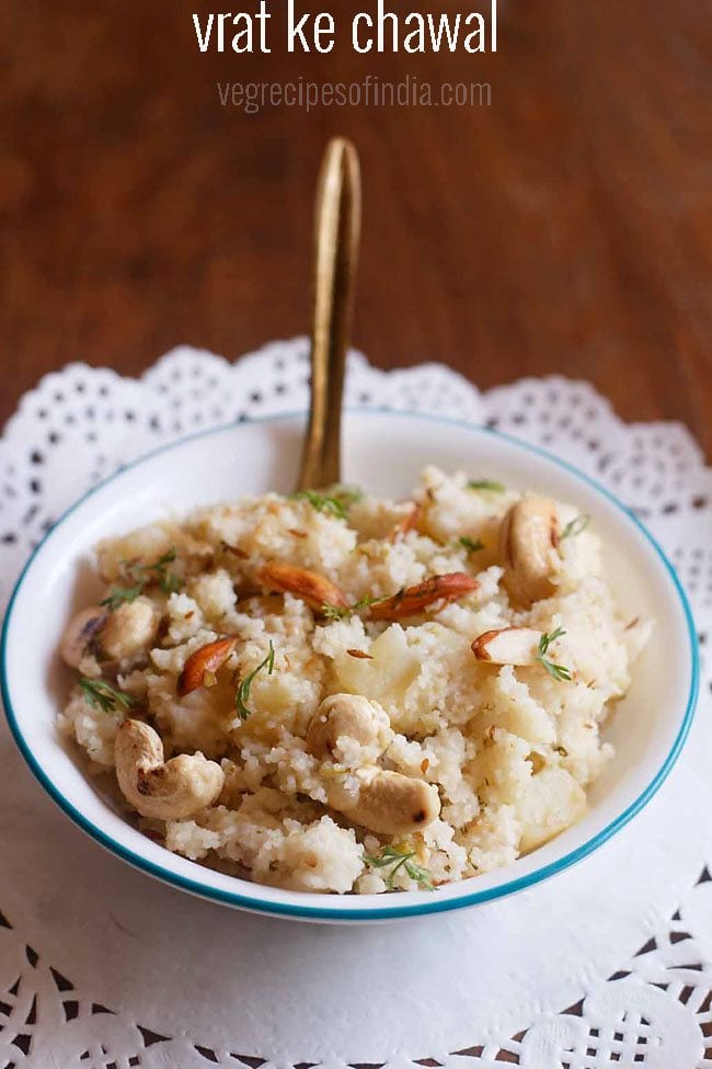 barnyard millet recipe of samak rice pulao served in a light blue rimmed bowl with a spoon inside it and text layovers.