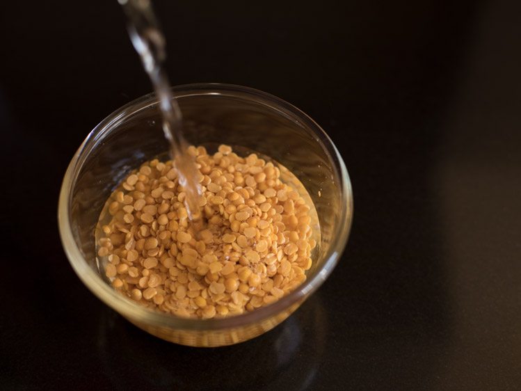 rinsing arhar dal in fresh water