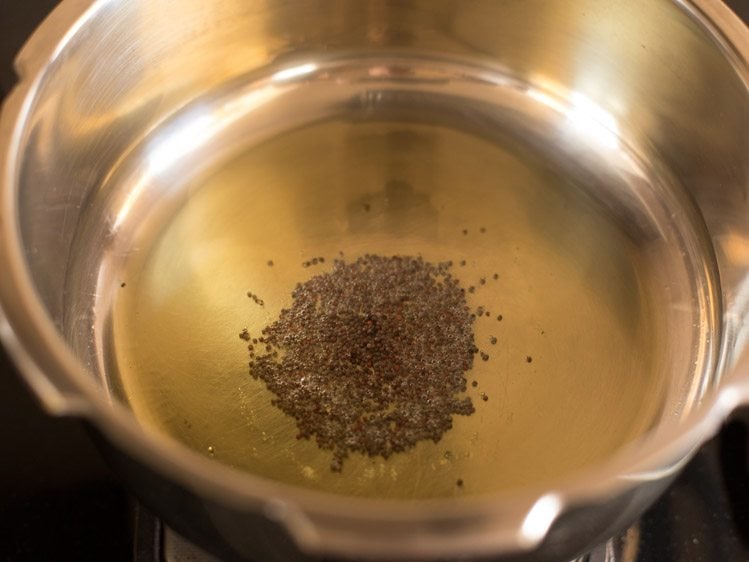 mustard seeds added to ghee