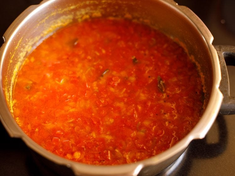 cooked tomato dal in the pressure cooker