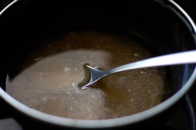 solución de azúcar para receta de ladoo de coco