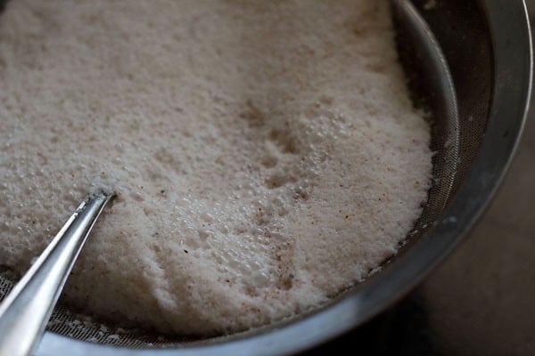 straining coconut shred for thin coconut milk.