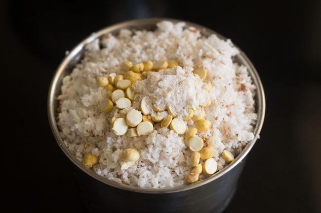 coconut, roasted chana dal and salt added to the grinder jar. 