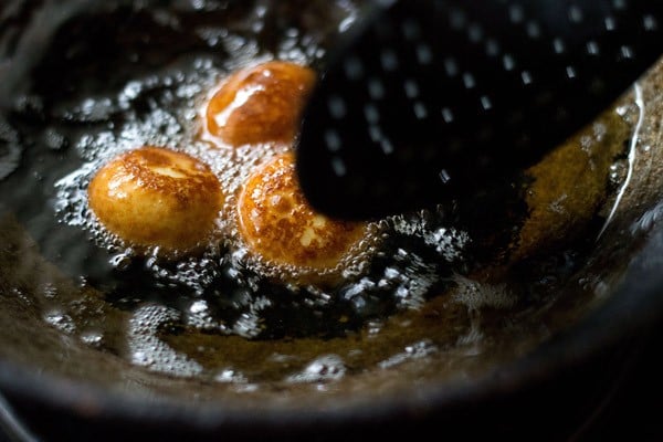 frying gulab jamun