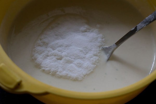 adding eno for white dhokla recipe