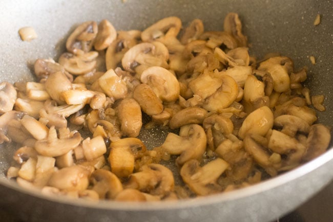 stir frying mushrooms till they brown