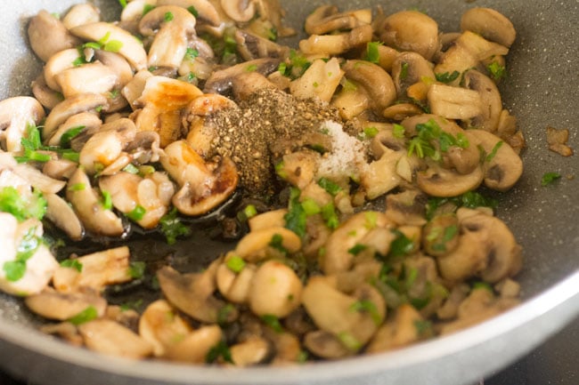 add soy sauce black pepper powder and salt to mushrooms