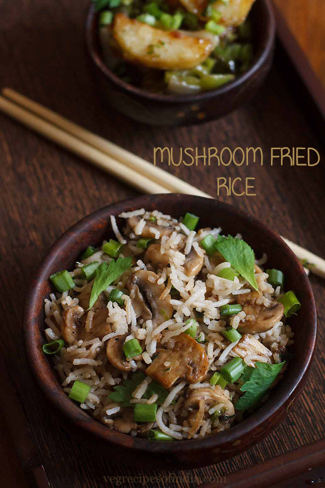 mushroom fried rice served in a black bowl with text layovers.